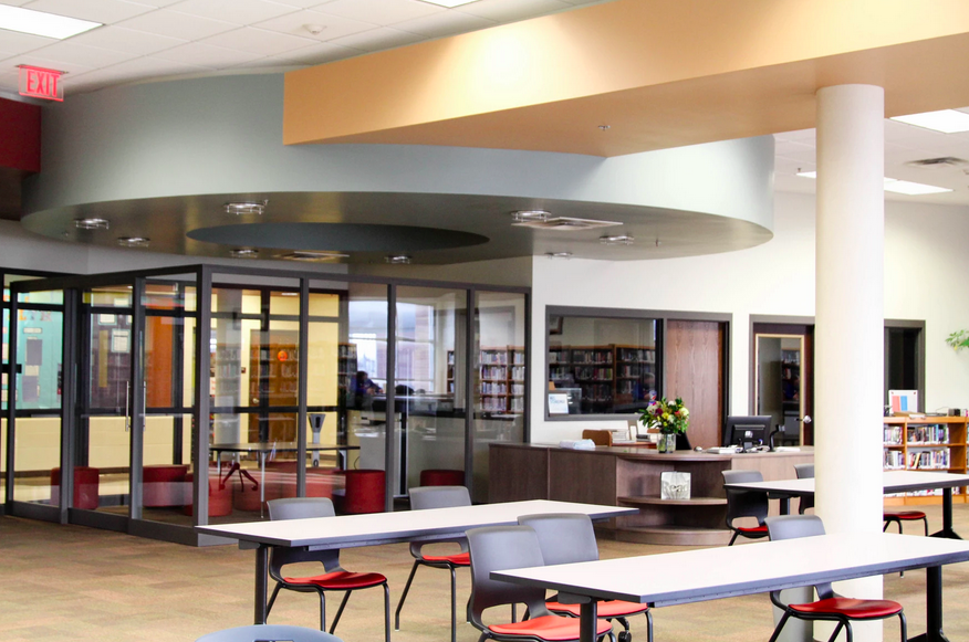 The library has a glass enclosure that&#8217;s used as a study space for students.