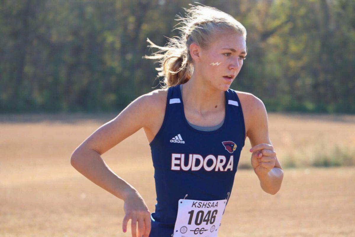 Sophomore Hanna Keltner pulls away from the competition during the regional race Saturday at Baldwin Golf Course. Keltner finished as the regional champion after coming in first place.