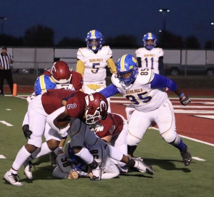 Senior Octavius Lyles breaks multiple tackles on a 5-yard touchdown run. The run was one of three red zone touchdowns for Lyles.