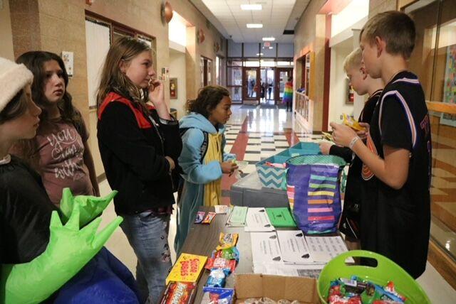 Students line up Friday morning to make store purchases.