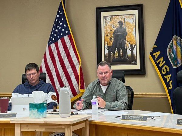 Planning commissioners Josh Harger and Grant Martin listen to Planning Consultant David Knopick discuss a potential quarry. Members of the public can attend a Nov. 16 Lawrence-Douglas County meeting to comment on the quarry. 