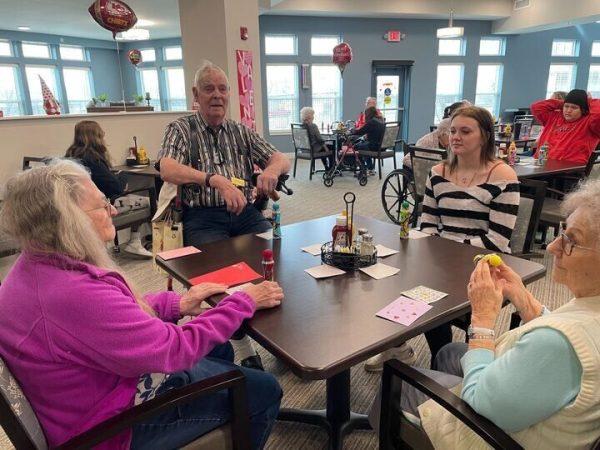 Jag-K students must complete 10 hours of community service each semester. The organization frequently visits Homestead Assisted Living & Memory Care of Eudora, where they play bingo with residents.