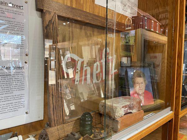 A museum exhibit shares the story of the museum’s renovation, alongside bricks and a window from the building when it was under Freddie Trefz’s ownership. 