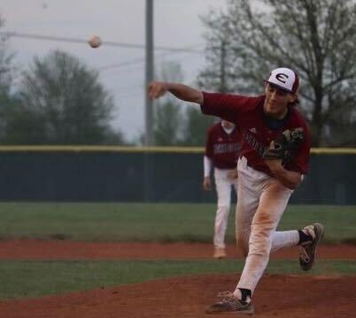 Senior Mason Cox slings a pitch toward home plate.
