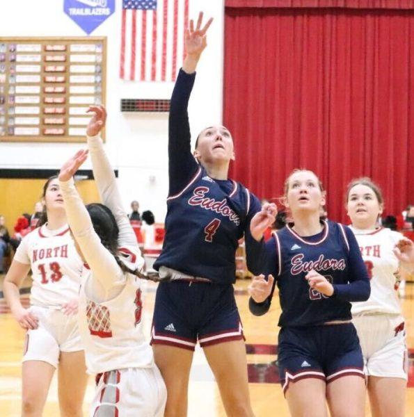 Senior Jayla Erpelding shoots a floater during the game against Shawnee Mission North Monday night. Erpelding had seven points on the night. 