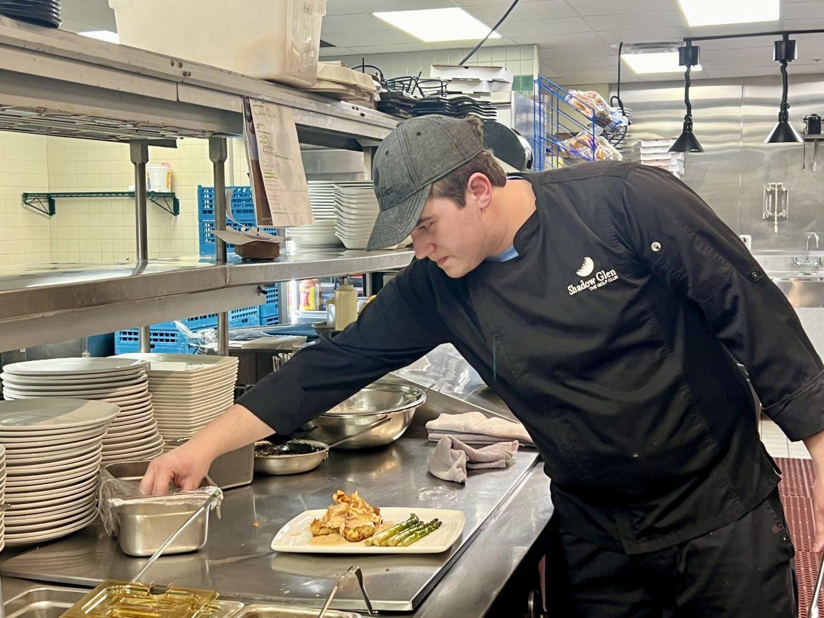 Boucher plates his crab cakes.&#160;