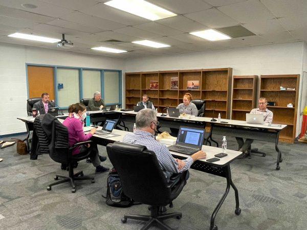 The School Board discusses turf financing options during its meeting Thursday.