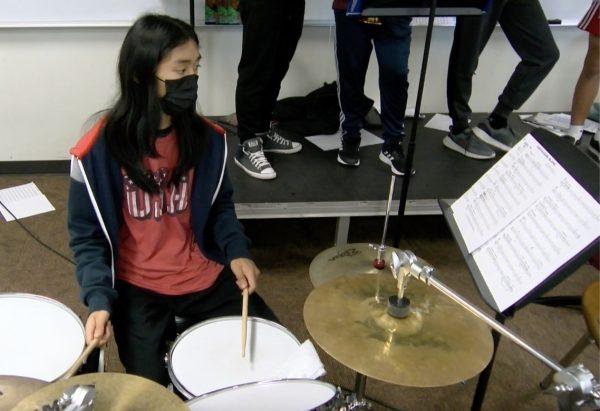Simon Walrod plays drums during a band class at EHS before his trip to Carnegie Hall.