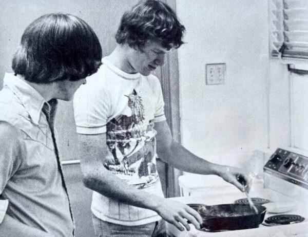 Home ec students cooking in the classroom. From the 1977 yearbook.