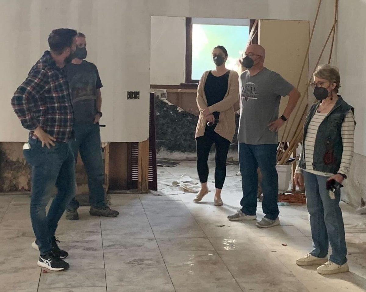 Library board members tour the basement of the old Methodist church during their meeting Wednesday and discuss the opportunities and challenges of the space.&#160;&#160;