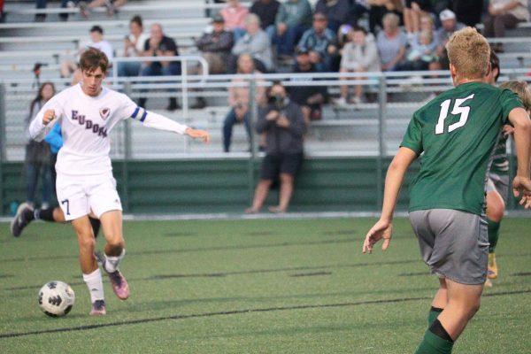 Junior Derek Lehmann sees an opening in De Soto's defense.
