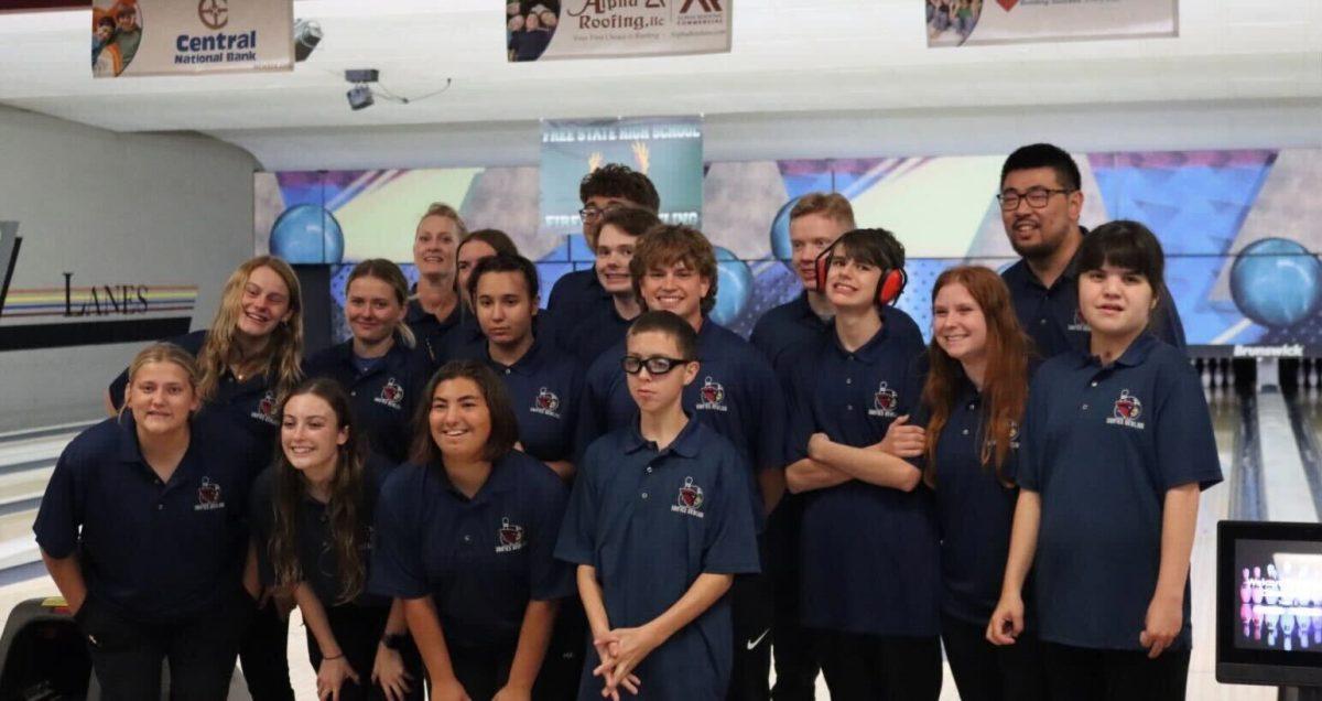 The unified bowling team gets together for a group photo before their first competition of the season Tuesday. One of the team&#8217;s subteams placed second in the competition with a six-game series total of 622.