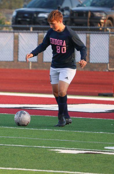 Sophomore Daniel Peterson controls possession of the ball against Heritage Christian Academy Monday night, as he and the Cardinals hold an early first half lead.