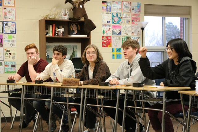 Justin Shoemaker, Jonas Staples, Sophia Nichols, Max Mitchell and Emiri White battle Ottawa in a Scholars Bowl varsity meet Wednesday night. The team won this round and placed third overall.