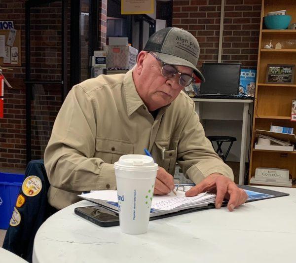 Library Board member Kenny Massey takes notes during Tuesday night’s meeting. Massey was selected to become president by the board.