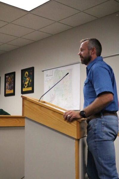 Alcove Development partner Dustin Baker discusses the development agreement with De Soto City Council during Thursday’s meeting. Alcove Development will move forward to close on the locally known old City Street Shop site located at 8180 Shawnee St. 