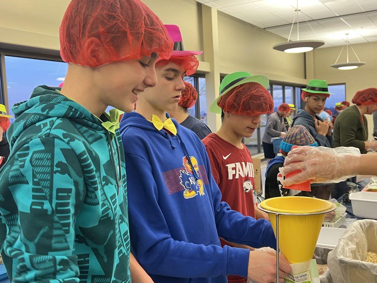 In just an hour, teams used speed and organization to get all the meals packed and into boxes.&#160;