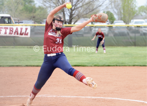 Senior Samantha Claire delivers a pitch to the plate Monday against Bonner Springs. Claire recorded a slew of strikeouts on her way to a shutout.  