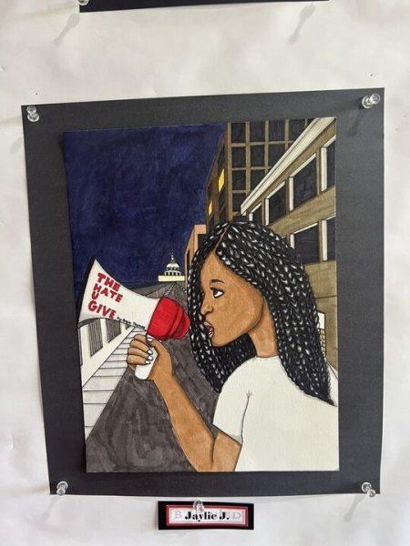 Here is Jackson’s “The Hate U Give” book cover at the library. 
 