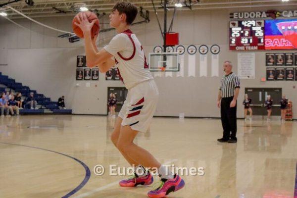 Freshman Cash Schneider takes a shot Thursday against Tonganoxie. The Cardinals took down the Chieftains 52-46.
 