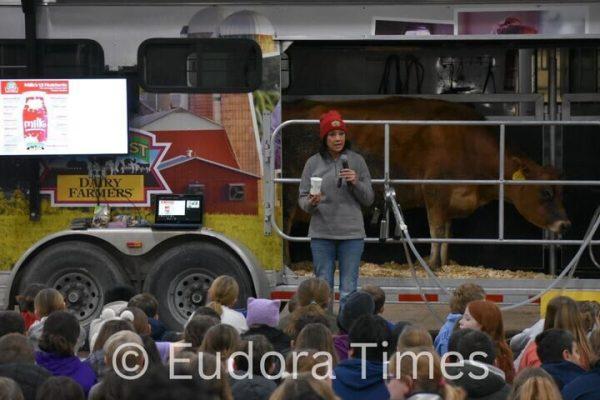 Fourth graders hear a presentation Wednesday explaining how milk is produced and its nutritional benefits at the Douglas County Fairgrounds.
