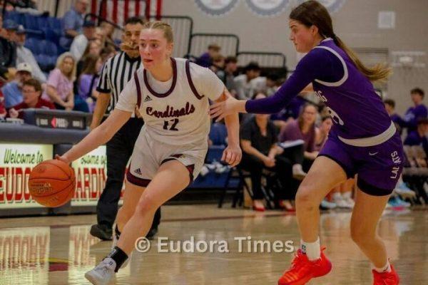 Sophomore Izzy Brunkow drives to the hoop during the Cardinals’ 61-34 win over Louisburg Tuesday night. 
 