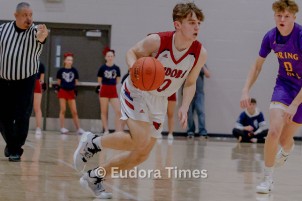 Senior Micaiah Jerome dribbles during the Cardinals’ win over Spring Hill on senior night.