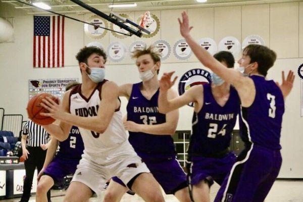 Eudora graduate Jaden Hamm dons a mask during a substate basketball game in 2021.
 