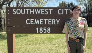 Aiden Mack made a new sign for the Southwest Cemetery for his Eagle Scout project.