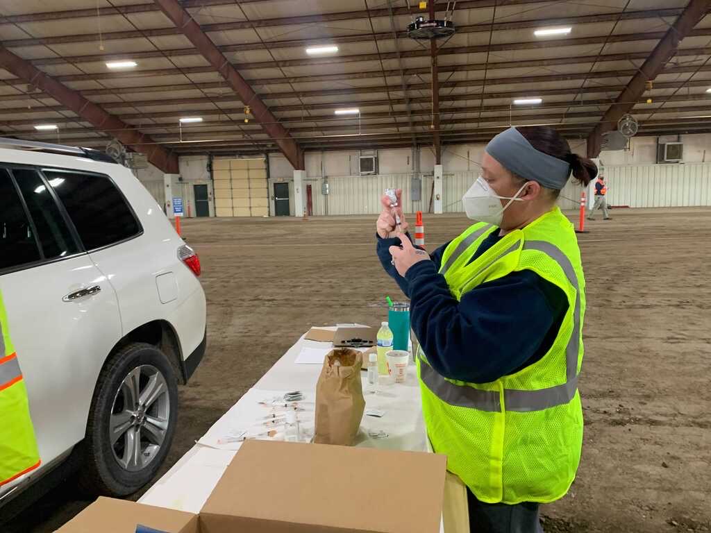 File photo. Volunteers gave vaccines during Phase 2 of the vaccination process at the Douglas County Fairgrounds on Jan. 29 2021. 