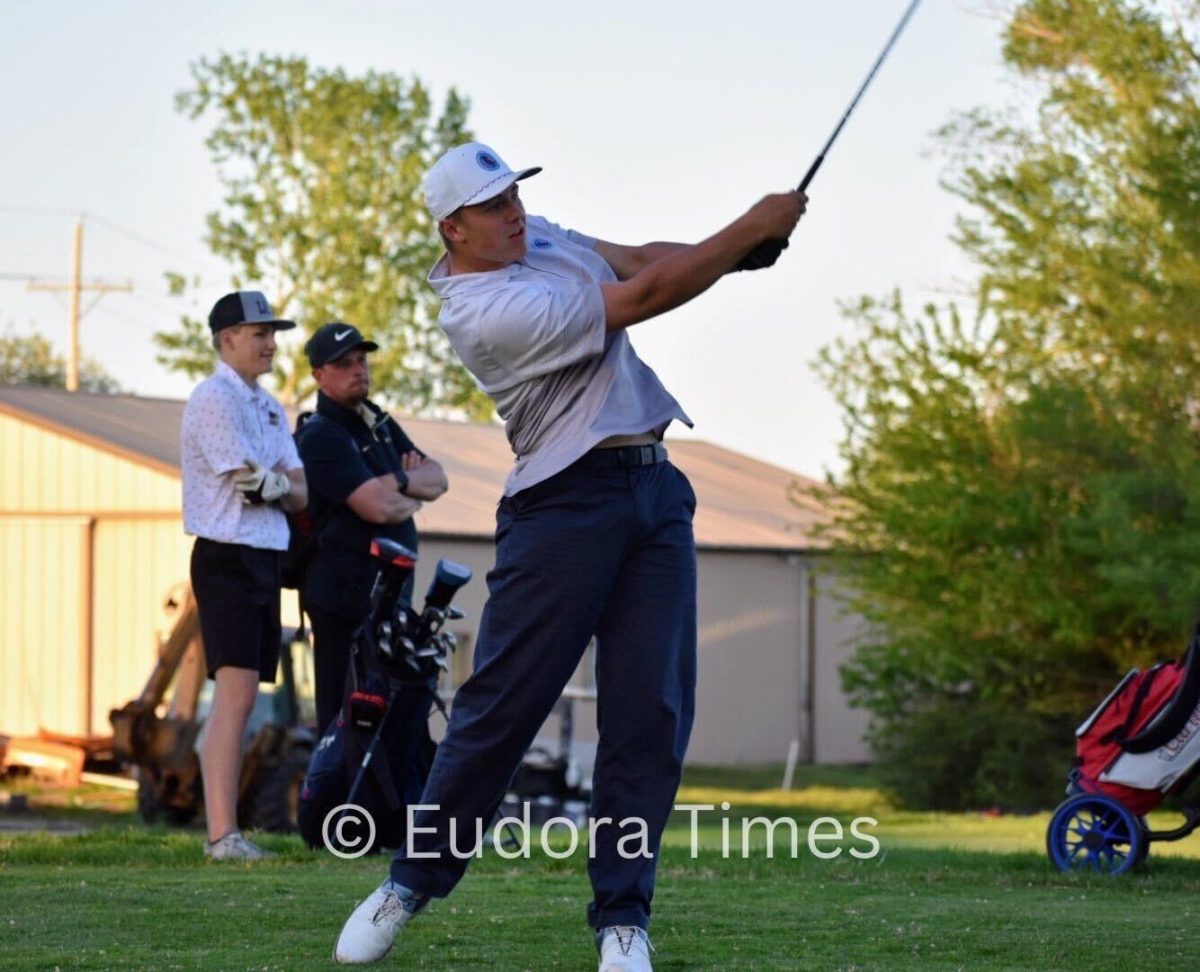 Junior Brady Von Holten follows through on his drive during the Jefferson West Invitational Tuesday night. Von Holten’s top-10 finish helped the Cardinals place second as a team. 
