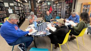 Library board members meet Tuesday night. The board entered a closed-door executive session about possibly purchasing the former quilt store at 736 Main St., but took no action following the discussion. 
