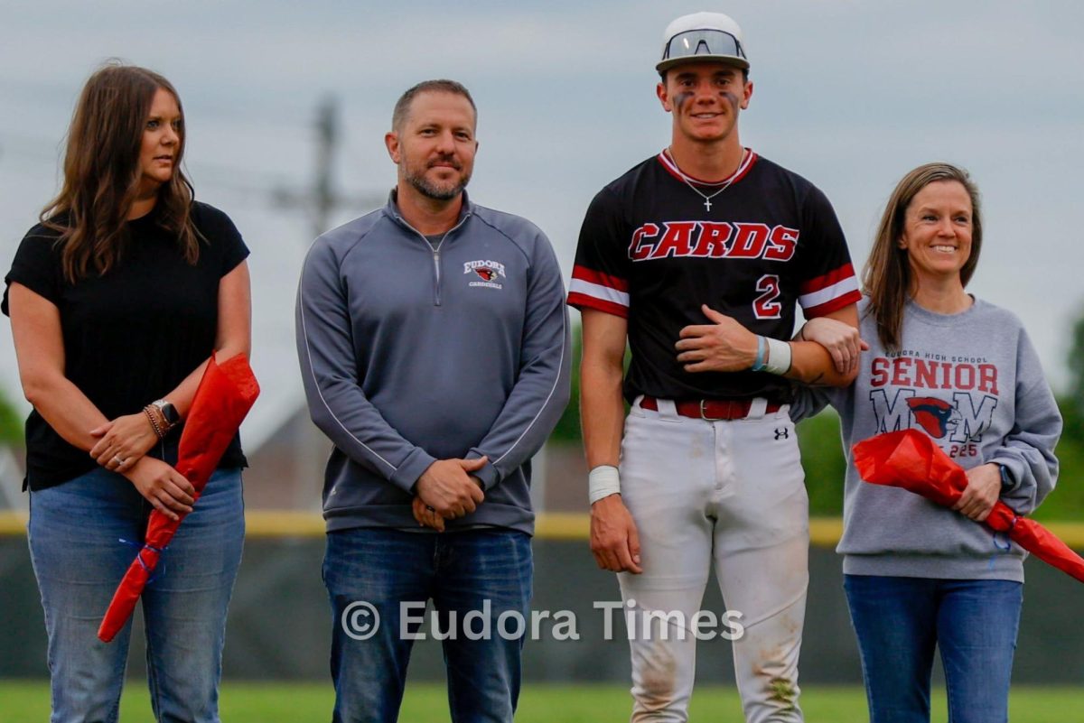 Senior Jackson Smith poses on senior night Tuesday. The Cardinals took down Louisburg 5-4. 
