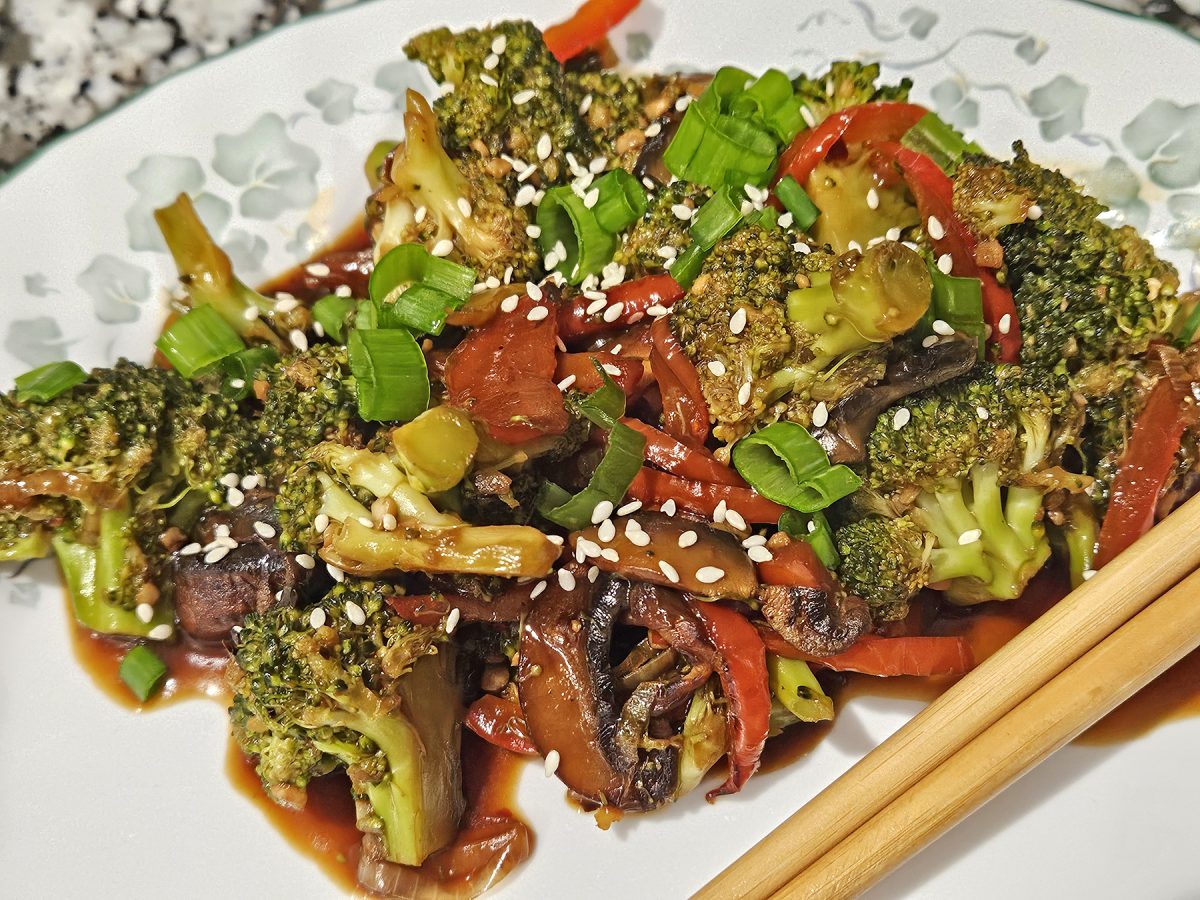 Chinese vegetable stir fry is heavy on the broccoli but really packs some great flavor with seasonings and the addition of earthy mushrooms and fresh garlic and ginger.