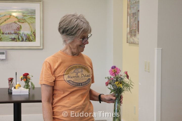 Crystal Hinman interacts with a resident at Homestead, which she said is her favorite part of volunteering for the Giving Garden.
