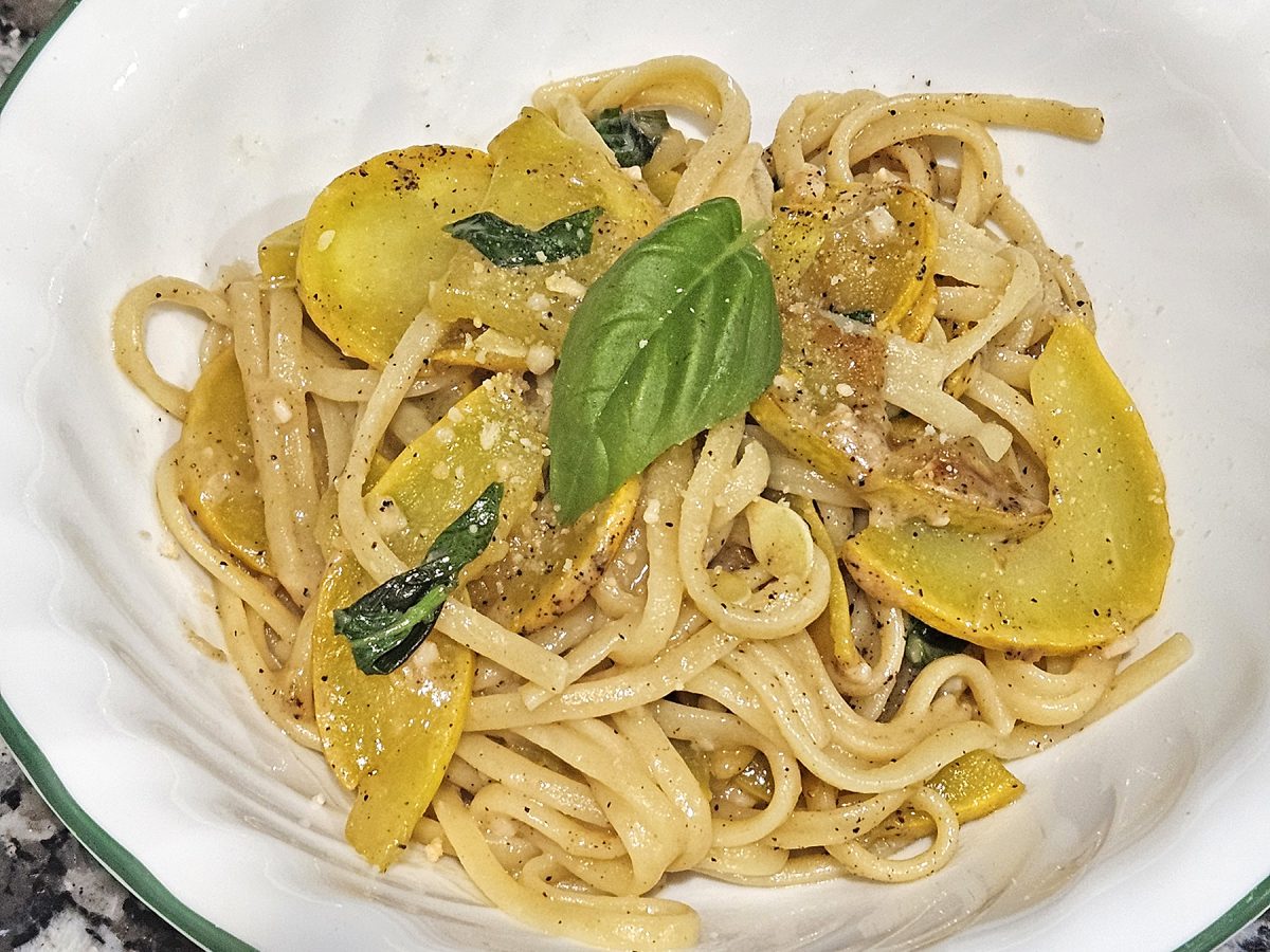 Garlic parmesan summer squash pasta is a great light summer recipe that features fresh basil and summer squash that is lightly seasoned and served with a from-scratch parmesan sauce.
