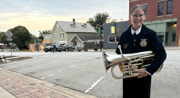 Maisy Mack plays the euphonium, which is a smaller brass instrument. Mack has also played the trombone and baritone. She collects antique instruments, too, and once made a clarinet into a lamp.