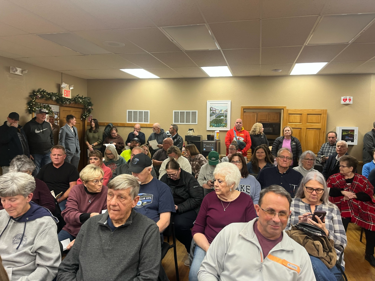 Community members pack into City Hall for Monday night’s meeting. 
