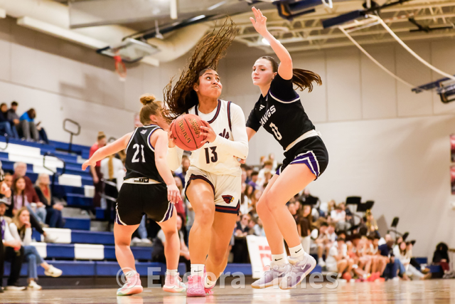 Girls win, boys fall to Baldwin