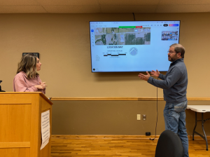 Resident Maggie Bratcher, left, said she is concerned about storm runoff with the new Holladay Woods development. Civil engineer Justin Milburn said the development is installing retention basins so that won’t happen.